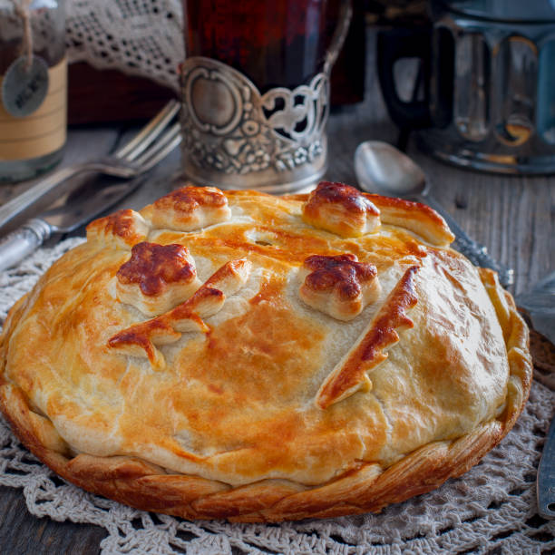 istock Traditional festive Russian pie - Kournik (pie with chicken and pancakes), square 923166022