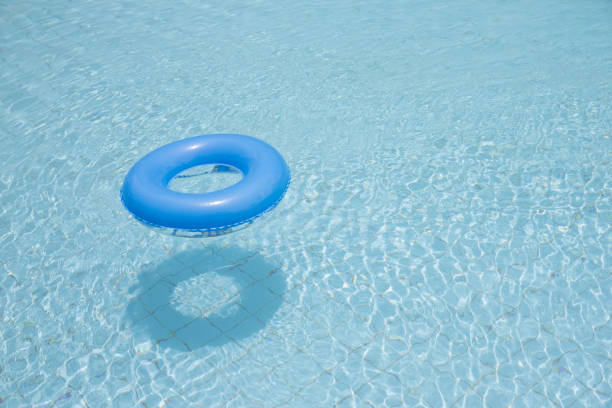 istock blue swim ring for children float on swimming pool isolated 923167268