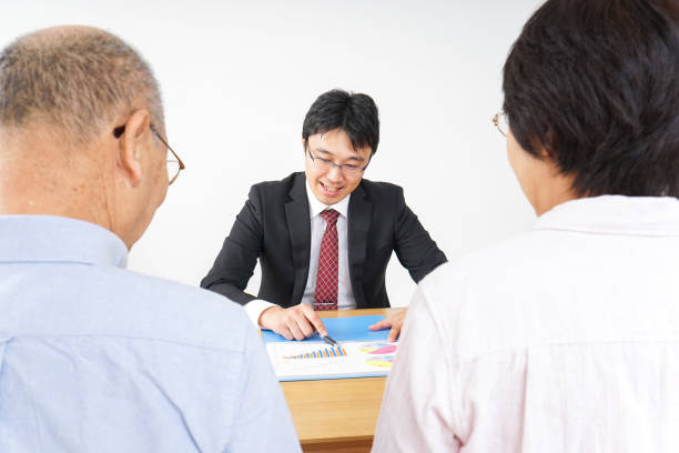 istock Aged couple and businessman 923170656