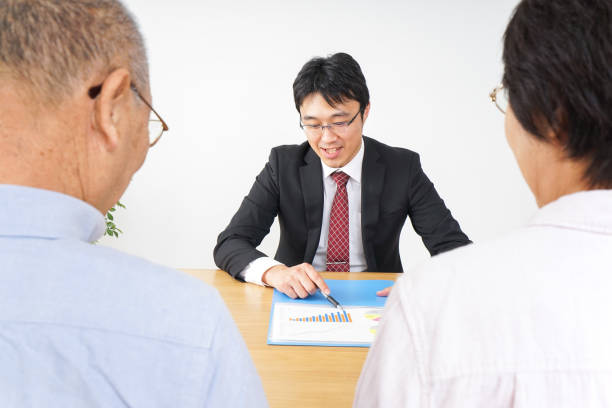 istock Aged couple and businessman 923170672