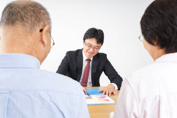 istock Aged couple and businessman 923170692