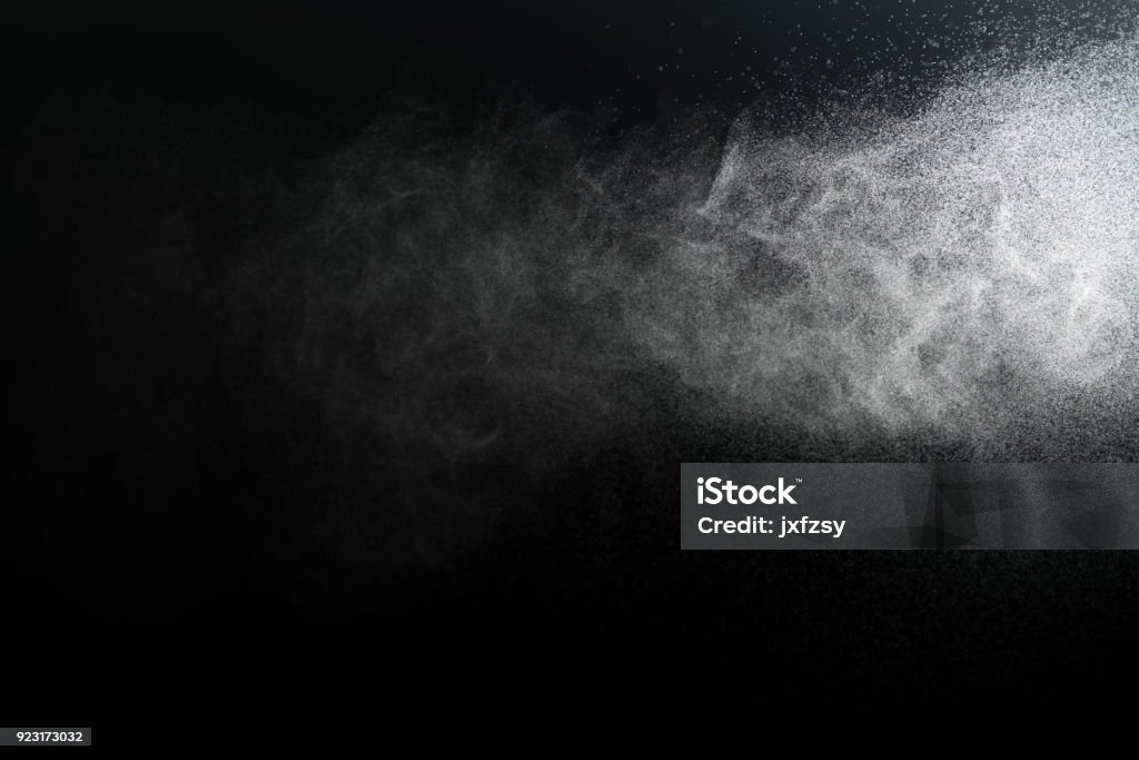 water spray with black background Water Stock Photo