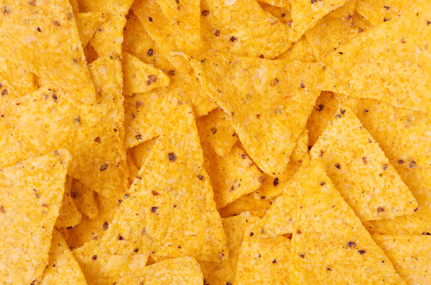 istock Classic mexican snack -  nachos background, top view. 923174622