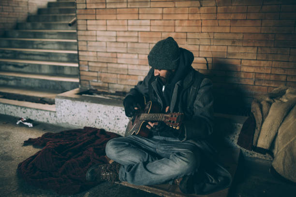 istock Playing guitar for some cash 923185140
