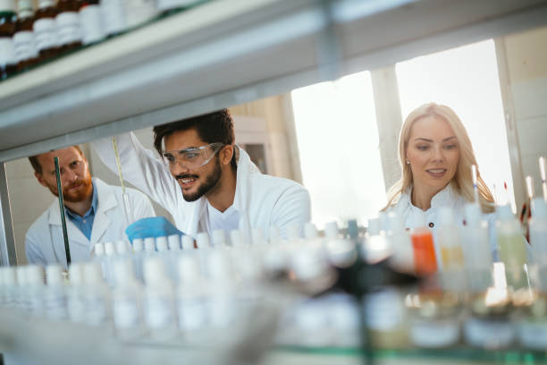 istock Group of chemistry students working in laboratory 923188780