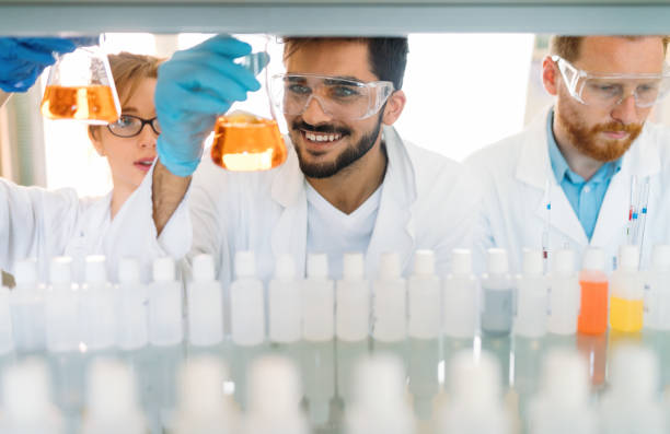 istock Group of students working at the laboratory 923189114