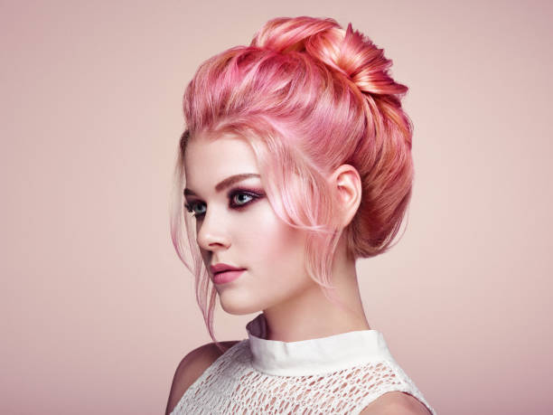 blonde girl with elegant and shiny hairstyle - fashion model pink beauty fashion imagens e fotografias de stock