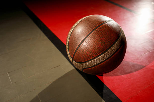 istock Basketball ball on court floor 923195560