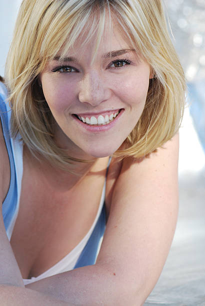 istock Blonde Woman Smiling Outside 92320563