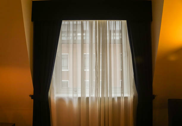 istock dark curtain at the window in master bedroom 923212132