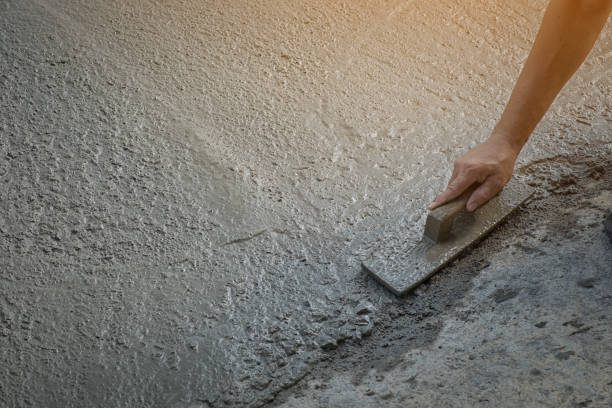 istock High Angle View Of Cropped Construction Worker Working On Road 923212400
