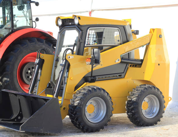 istock Agricultural machinery, front loader at the exhibition 923215572