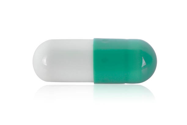 istock single capsule pills isoated on white background 923216160