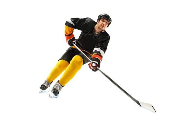 istock Ice hockey player in action isolated on white 923217406