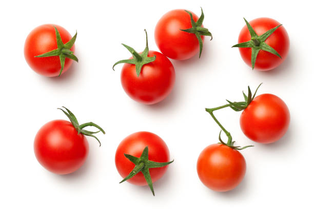 cherry-tomaten, isoliert auf weißem hintergrund - cherry tomato image raw colors stock-fotos und bilder
