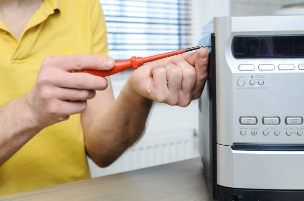 istock Repair of the musical system. 923224726
