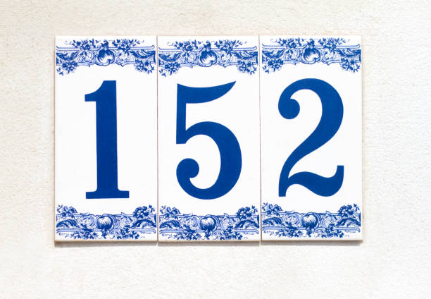 istock Italy: Ceramic Number 152 Street Address Tile; White Wall 923224916