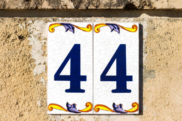 istock Italy: Ceramic Number 44 Street Address Tile (Close-Up) 923225330