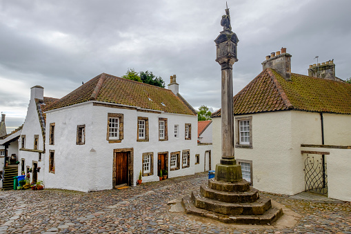 Culross, one of the most picturesque villages in Scotland, with its white-harled houses with red-tiled roofs and steep cobbled streets. Fife, Scotland