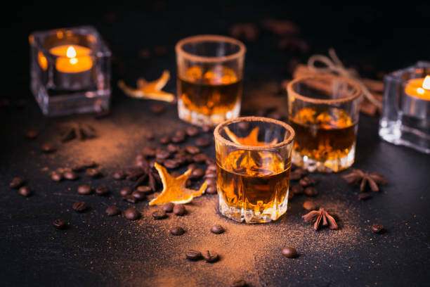 istock Whiskey, brandy or liquor, spices, anise stars, coffee beans, cinnamon sticks 923234012