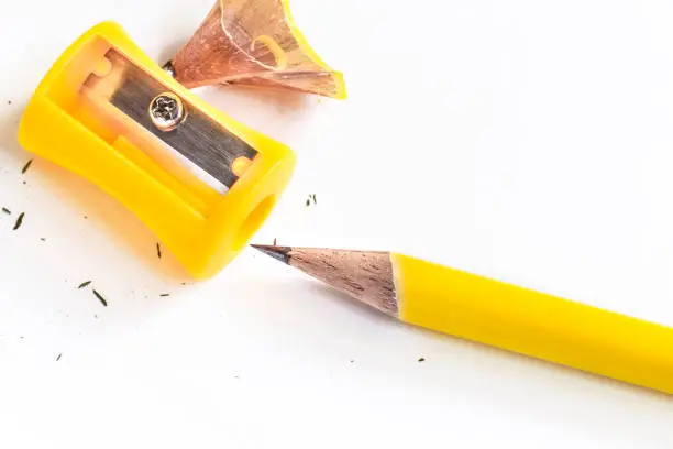 pencil-sharpener and pencil isolated on white paper background.  with copy space for your text.