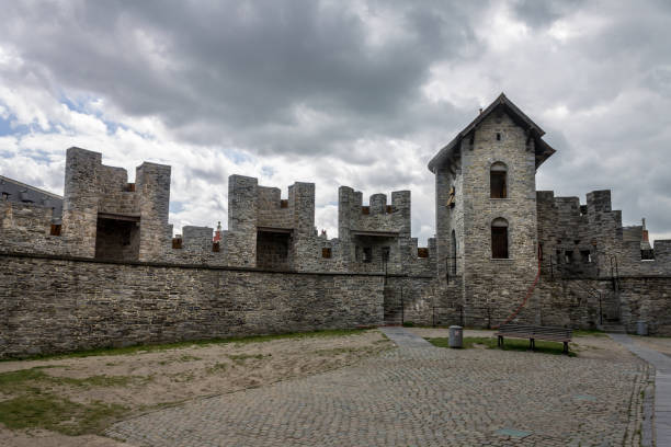 Old Kamianets-Podilskyi Castle under the cloudy sky. Part of the powerful bastions of the castle. The fortress located among the picturesque nature in the historic city of Kamianets-Podilskyi, Ukraine