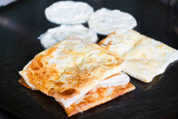 istock Indian Roti or bread being baked on the pan 923237952