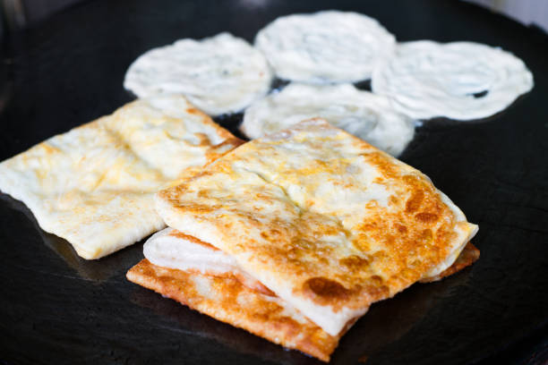 istock Indian Roti or bread being baked on the pan 923237984