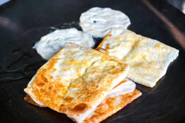 istock Indian Roti or bread being baked on the pan 923237986