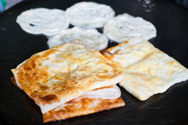 istock Indian Roti or bread being baked on the pan 923238006