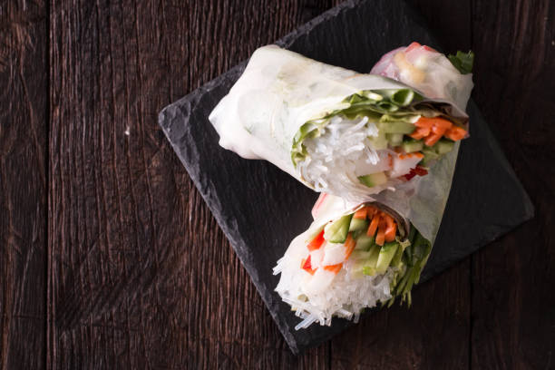 istock Delicious vietnamese spring roll with vegetable on dark background ,healthy food 923238142