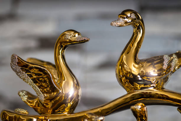 Gold statuette of swans