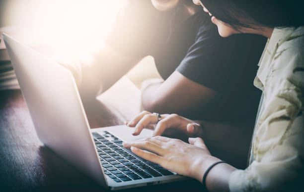 young people being used computer. education and technology concept.