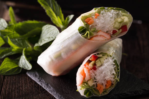 istock Delicious vietnamese spring roll with vegetable on dark background ,healthy food 923241714
