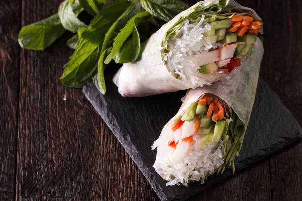 istock Delicious vietnamese spring roll with vegetable on dark background ,healthy food 923244558