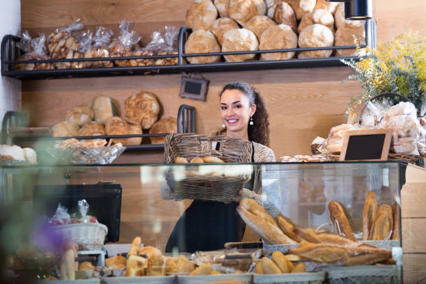 istock young woman at bakery display 923246370