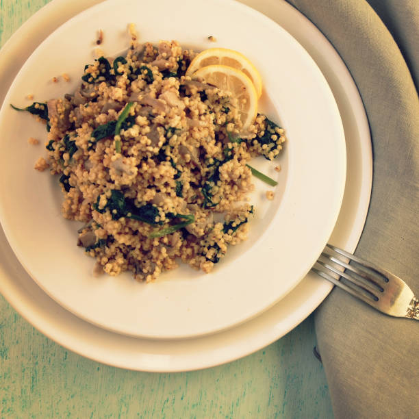 Vegetarian couscous with mushrooms and spinach.