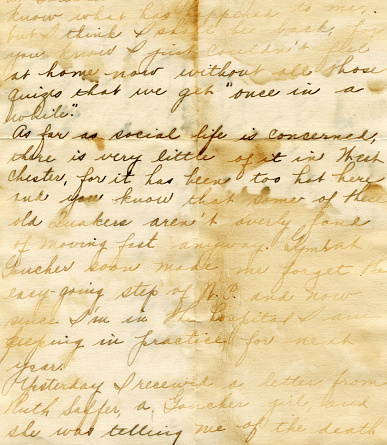 An old hand written letter that has a grunge appeal from water damage.
