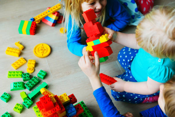 istock kids play build with plastic blocks indoors 923262688