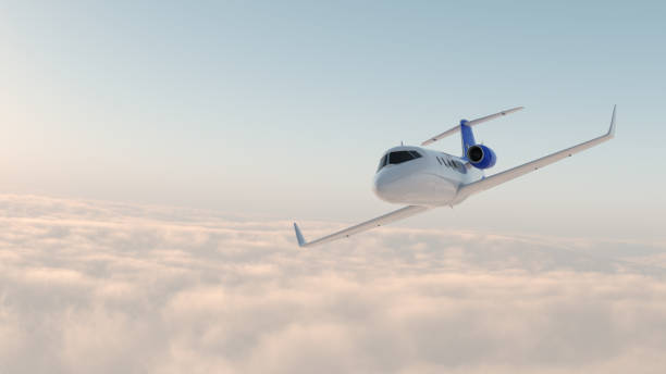Corporate jet in the sky stock photo
