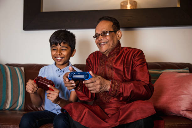 istock Playing Video Games with his Grandson 923274944