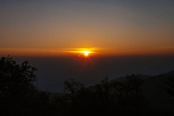 istock Natural sunset sunrise over mountain 923279056