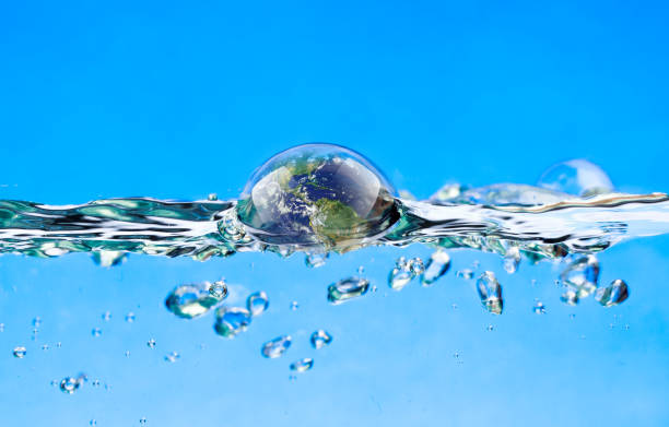 istock Swimming earth in the water 923282138