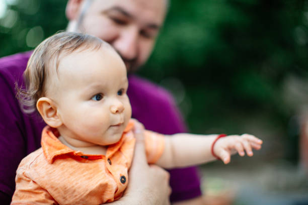 istock Cute baby boy with his father 923290140