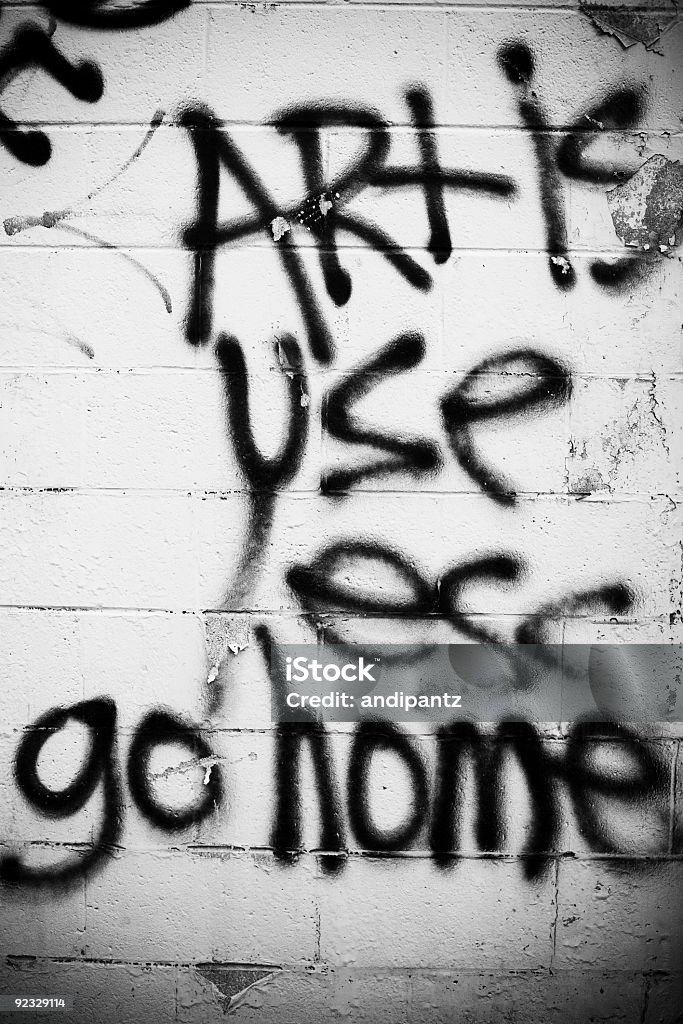 art is useless go home Graffiti message on a wall that says "art is useless go home" Abstract Stock Photo