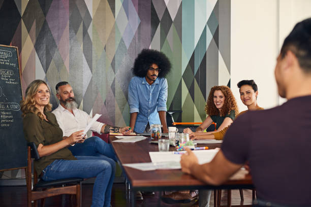 istock Gathering insight from every member in the team 923293298