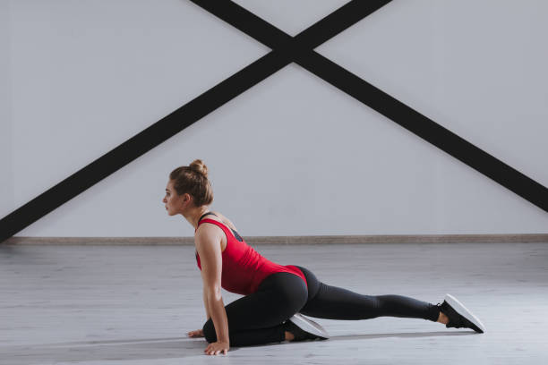 istock Young beautiful fitness female posing in studio 923297372