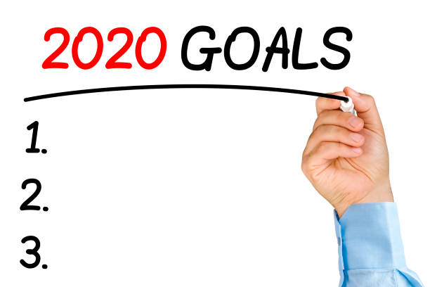 istock Businessman underlining 2020 goals text with black felt-tip 923297686