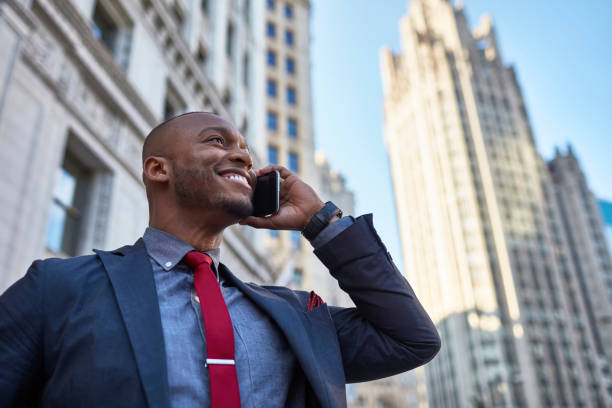Businessman talking on his mobile phone in downtown Chicago