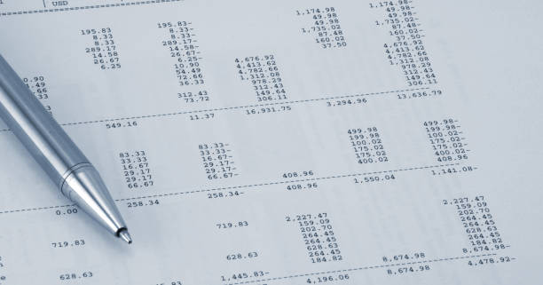 istock Accounting concept. Pen on a numbers background 923305236